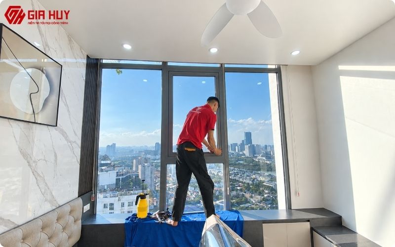 Thi công dán giấy dán kính